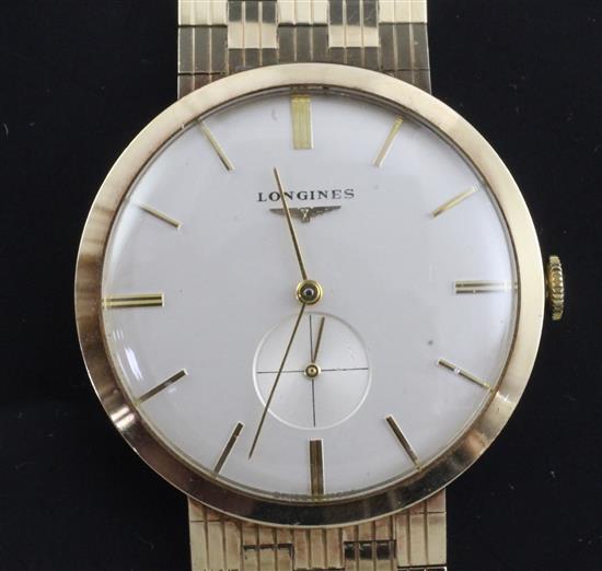 A gentlemans early 1960s 9ct gold Longines manual wind wrist watch,